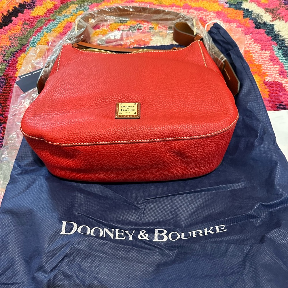 100% Authentic brand new with tags red Dooney & Bourke handbag w/ dust bag